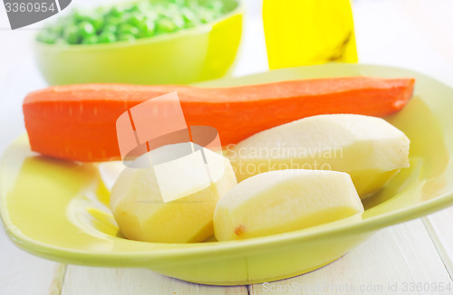 Image of Fresh vegetables, raw potato and carrot