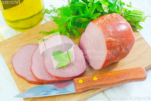 Image of Ham on wooden board