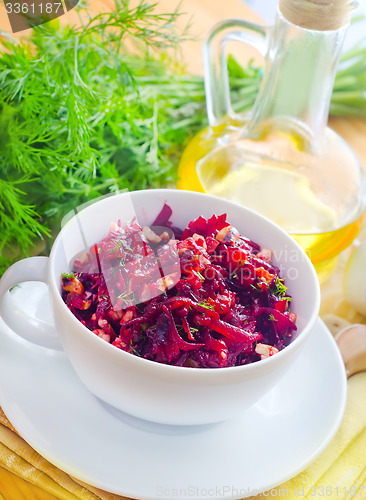Image of Fresh salad with beet and walnuts, vegetarian salad