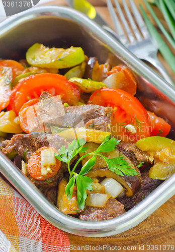 Image of baked meat with vegetables