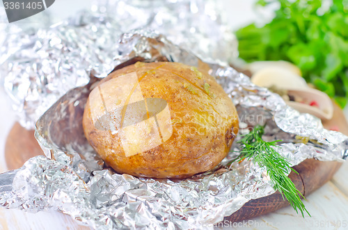 Image of baked potato in foil