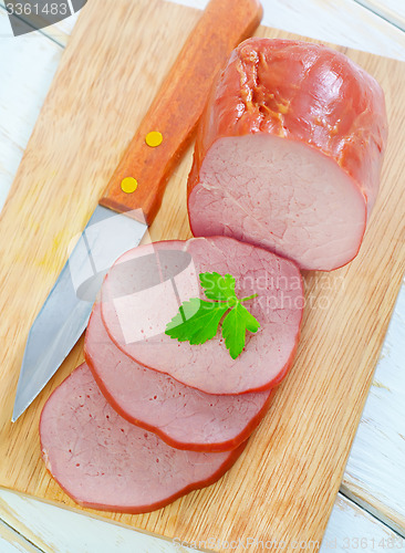 Image of Ham on wooden board