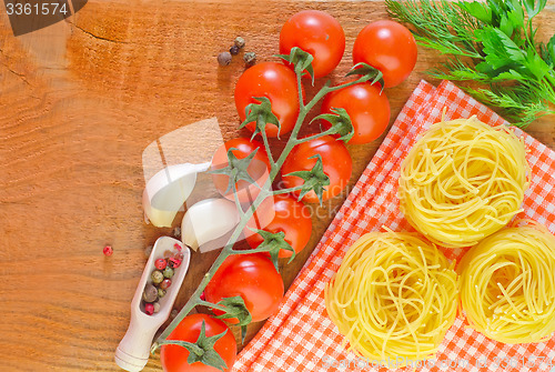 Image of raw pasta and tomato