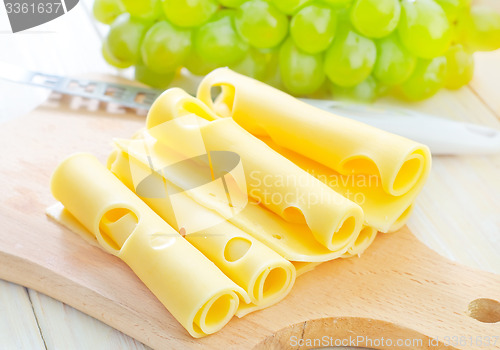 Image of cheese  and grape