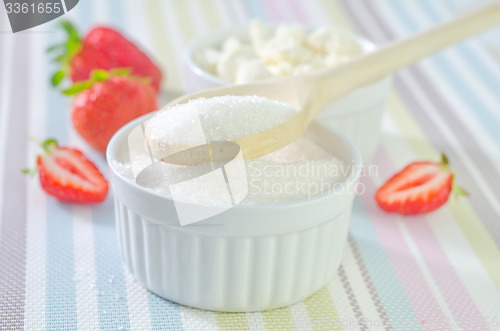 Image of cottage with strawberry