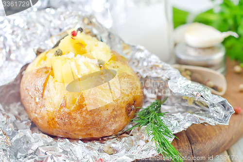 Image of baked potato in foil