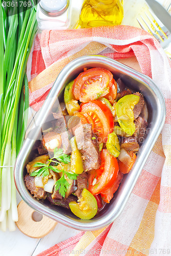 Image of baked meat with vegetables