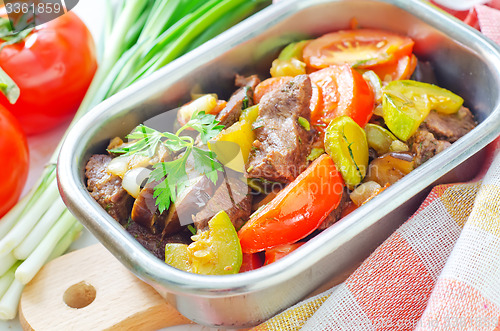 Image of baked meat with vegetables