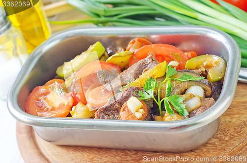 Image of baked meat with vegetables