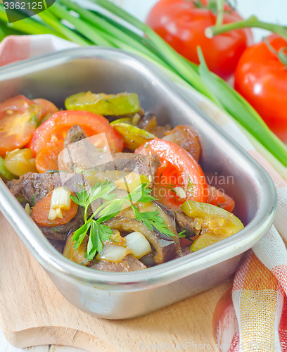 Image of baked meat with vegetables