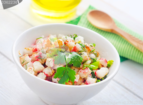 Image of Fresh salad with greens and seafood