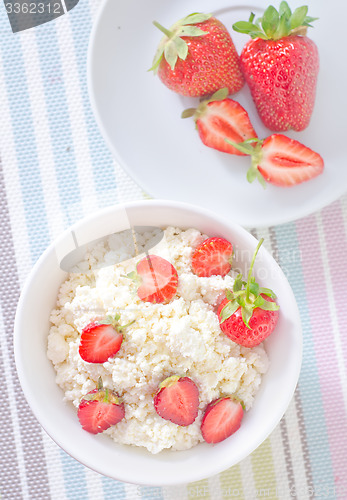 Image of cottage with strawberry