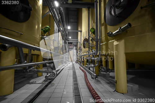 Image of Industrial interior with welded silos