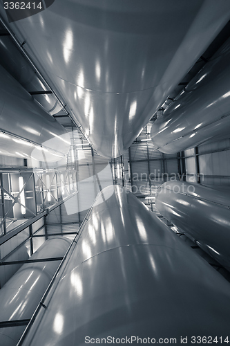 Image of Industrial interior with welded silos