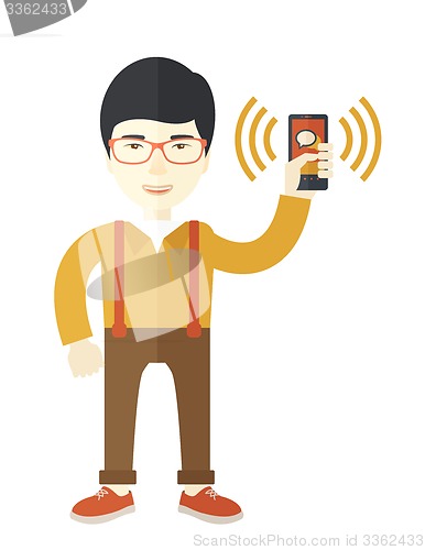 Image of Office worker and his smartphone.