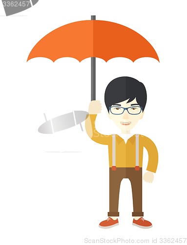 Image of Successful man with umbrella.