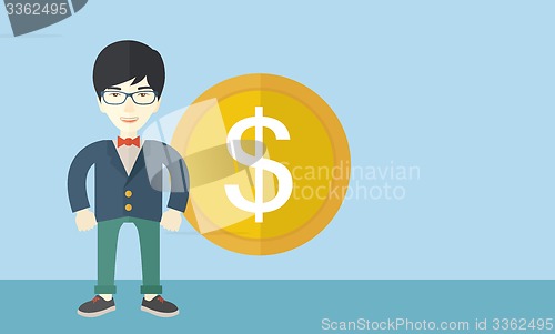 Image of Happy businessman standing with a big dollar coin beside him.