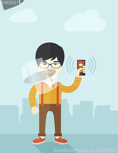 Image of Japanese Office worker and his smartphone.