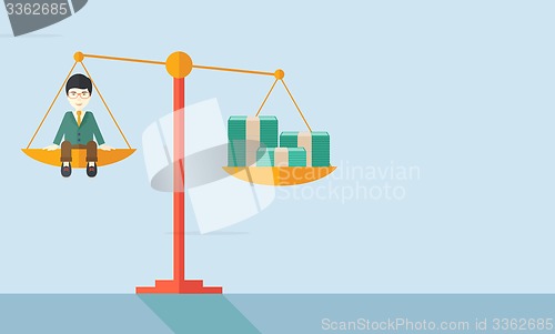 Image of Japanese Businessman on a balance scale