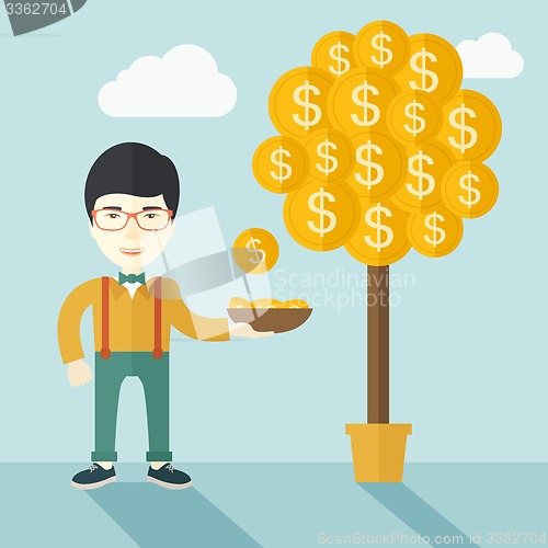 Image of Successful chinese businessman standing while catching a dollar coin.