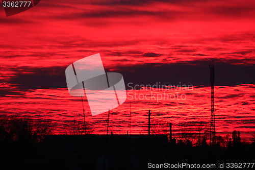 Image of Dark sunset above the multistory house