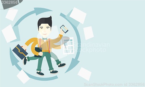 Image of Chinese man with multitasking job