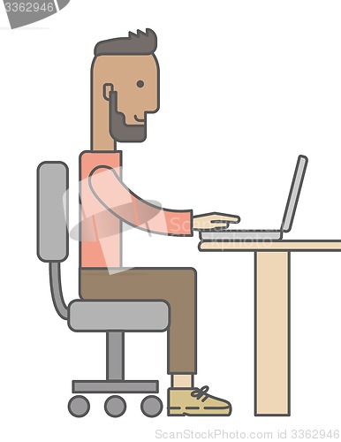 Image of Man working with laptop