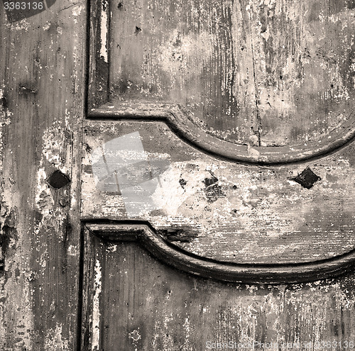 Image of  traditional   door    in italy   ancian wood and traditional  t