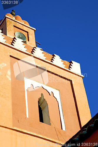 Image of  muslim  in morocco  africa  minaret religion and  blue    sky