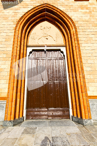 Image of  lombardy    in  the  cortese   old   church  closed brick tower