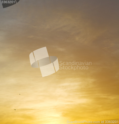 Image of light  the sunrise in  colored sky white soft clouds and abstrac