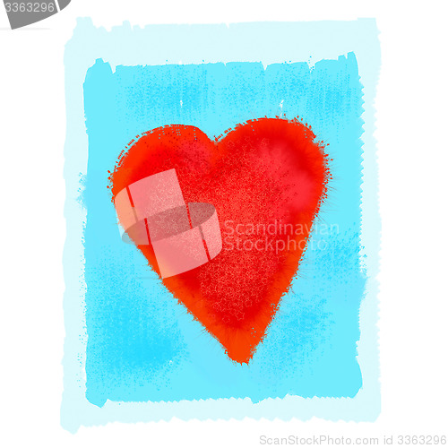 Image of Bright red heart on blue background