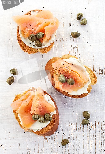 Image of toasted bread with cream cheese and salmon fillet