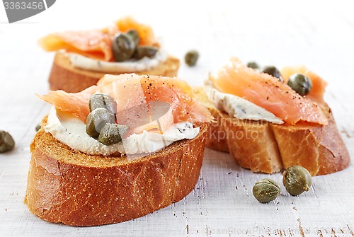 Image of toasted bread with cream cheese and salmon fillet