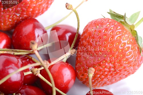 Image of Sweet cherries and strawberries close up