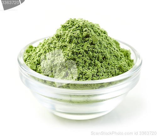 Image of bowl of green wheat sprouts powder