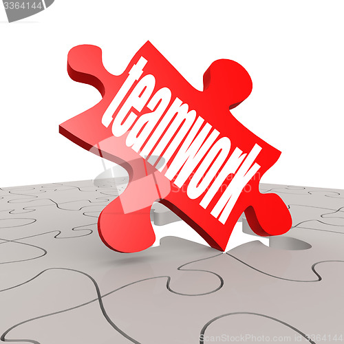 Image of Teamwork word with puzzle background
