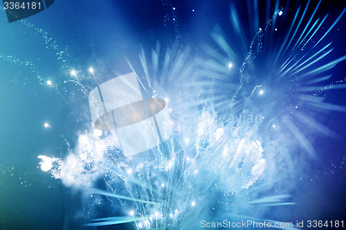 Image of bright blue and white fireworks