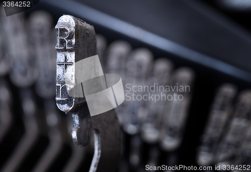 Image of R hammer - old manual typewriter - cold blue filter