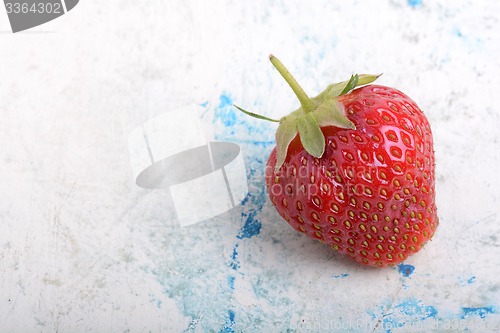 Image of Close up of Korea strawberry with green leaves