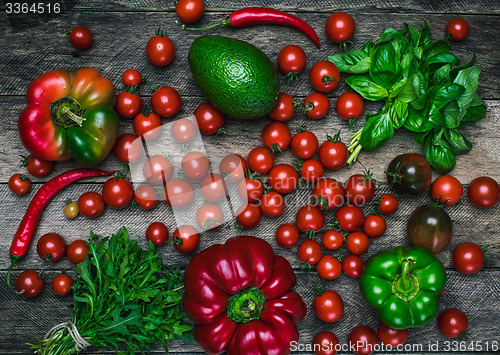 Image of Tasty vegetables on wooden table in rustic style