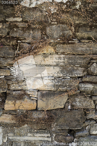 Image of Old weathered stone wall texture or background