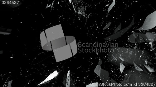 Image of Pieces of splitted or broken glass on black