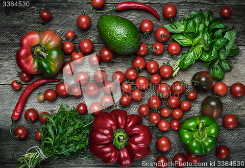 Image of Fresh vegetables on wooden table in rustic style