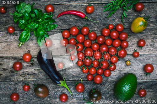 Image of Tomato heart shape and vegetables as healthy lifestyle concept