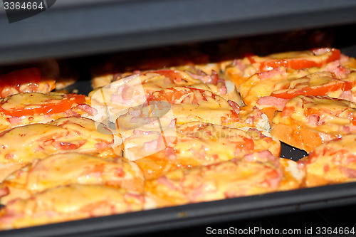 Image of hot sandwiches cooking in the kitchen-range