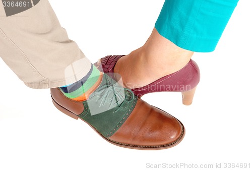 Image of The shoe of a woman and man.