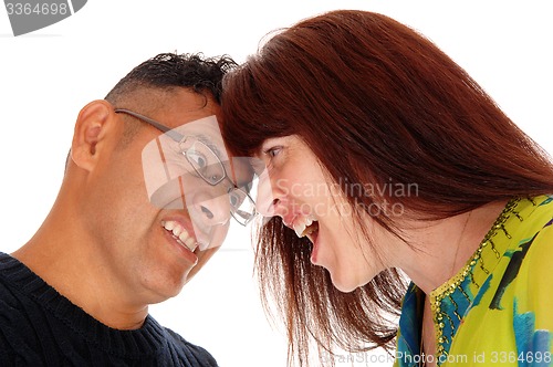 Image of Couple with head\'s together fighting.