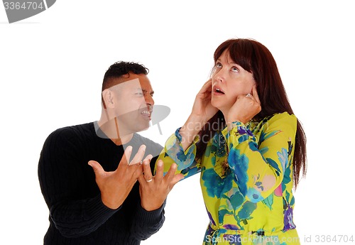 Image of Middle age couple arguing.