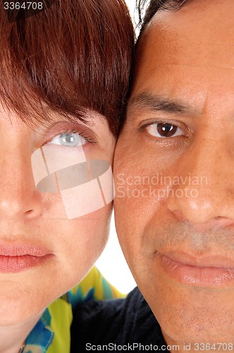 Image of The halve faces of a middle age couple.